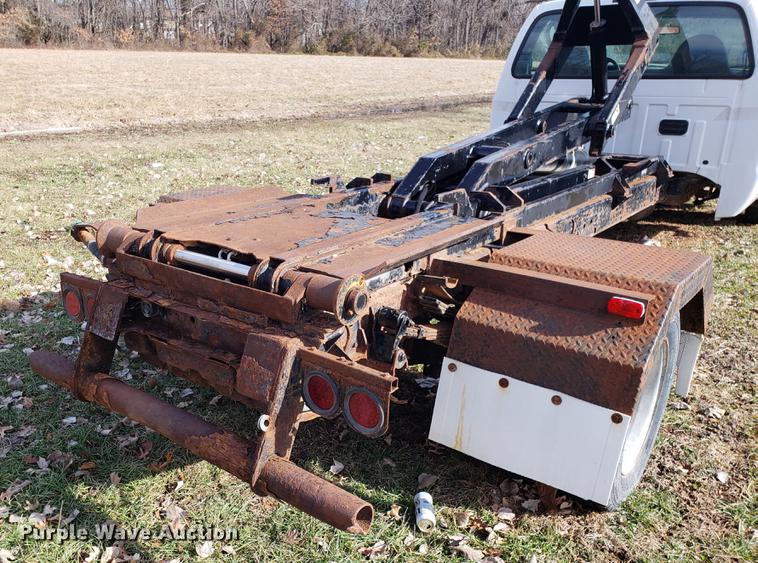 image for item EN9755 2003 Ford F550 roll-off container truck