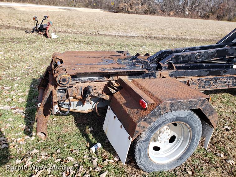 image for item EN9755 2003 Ford F550 roll-off container truck