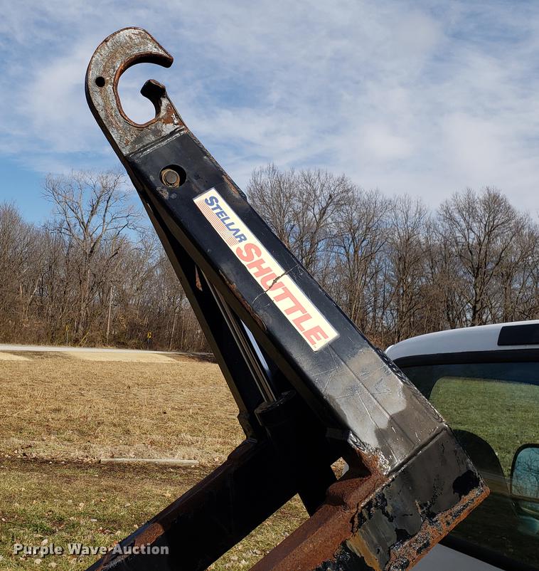 image for item EN9755 2003 Ford F550 roll-off container truck