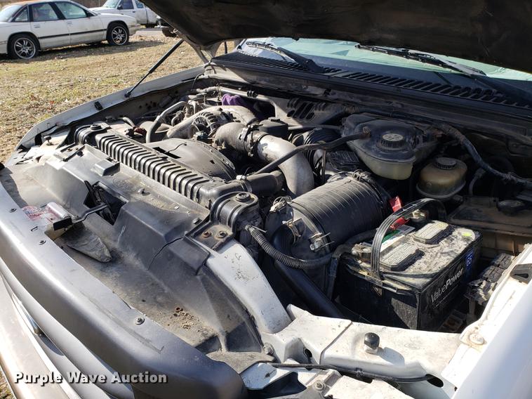 image for item EN9755 2003 Ford F550 roll-off container truck