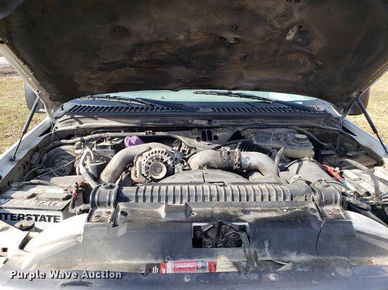 image for item EN9755 2003 Ford F550 roll-off container truck