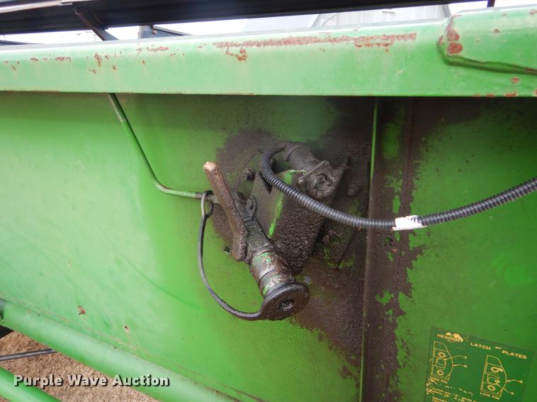image for item FH9015 1990 John Deere 930 rigid head and trailer