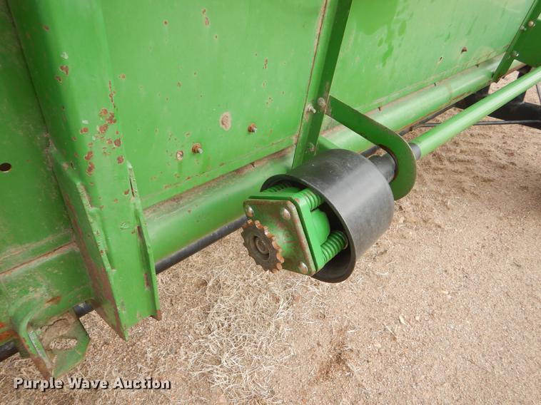 image for item FH9015 1990 John Deere 930 rigid head and trailer