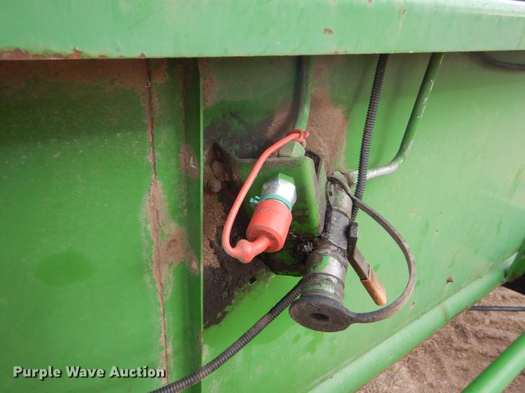image for item FH9015 1990 John Deere 930 rigid head and trailer