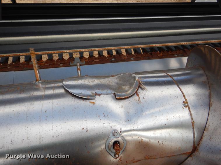 image for item FH9015 1990 John Deere 930 rigid head and trailer