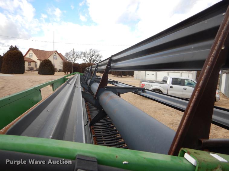 image for item FH9015 1990 John Deere 930 rigid head and trailer