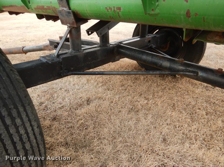 image for item FH9015 1990 John Deere 930 rigid head and trailer