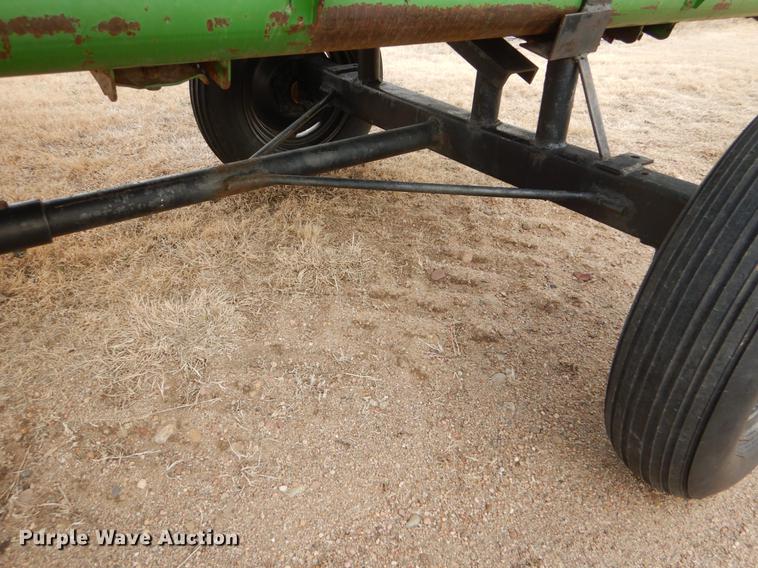 image for item FH9015 1990 John Deere 930 rigid head and trailer