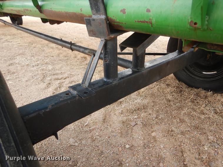 image for item FH9015 1990 John Deere 930 rigid head and trailer