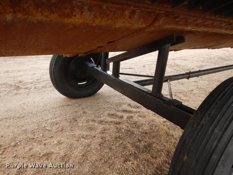 image for item FH9015 1990 John Deere 930 rigid head and trailer