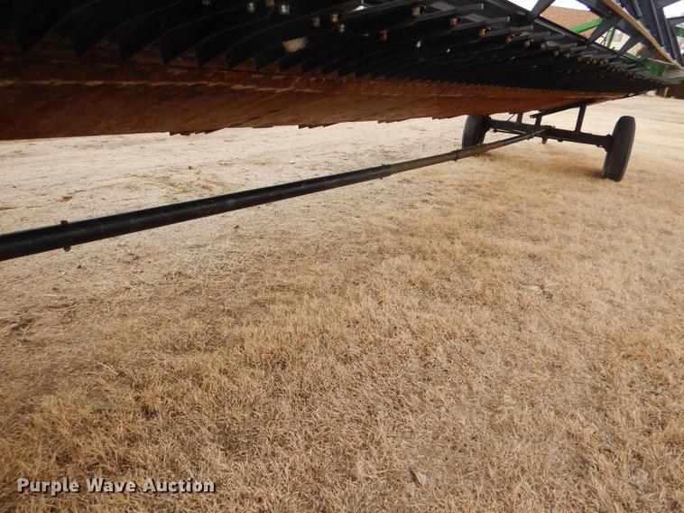 image for item FH9015 1990 John Deere 930 rigid head and trailer