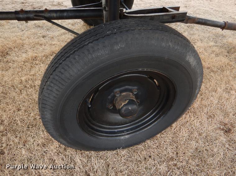 image for item FH9015 1990 John Deere 930 rigid head and trailer