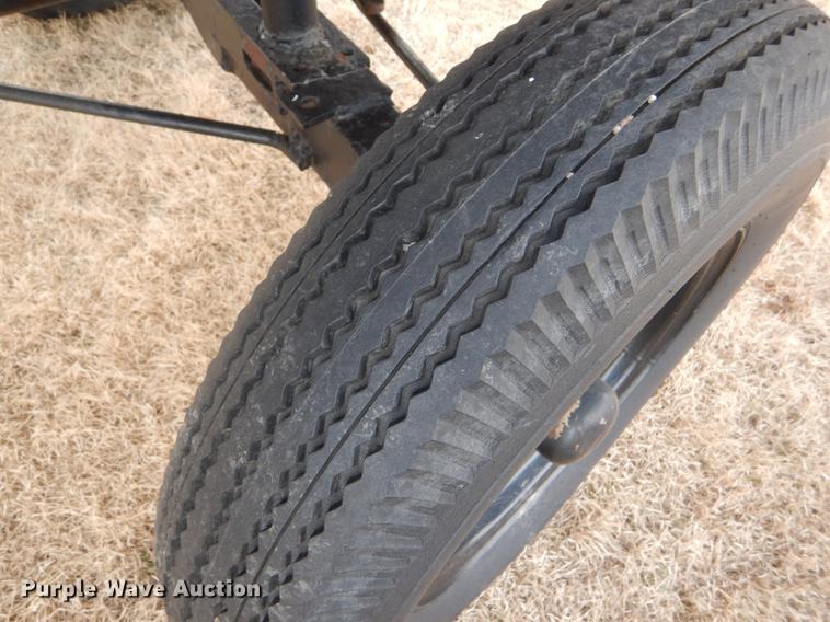 image for item FH9015 1990 John Deere 930 rigid head and trailer