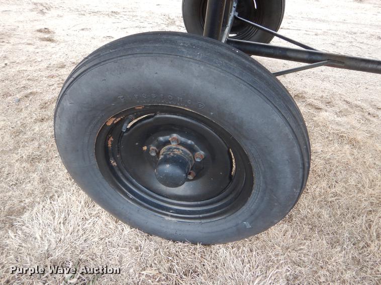 image for item FH9015 1990 John Deere 930 rigid head and trailer