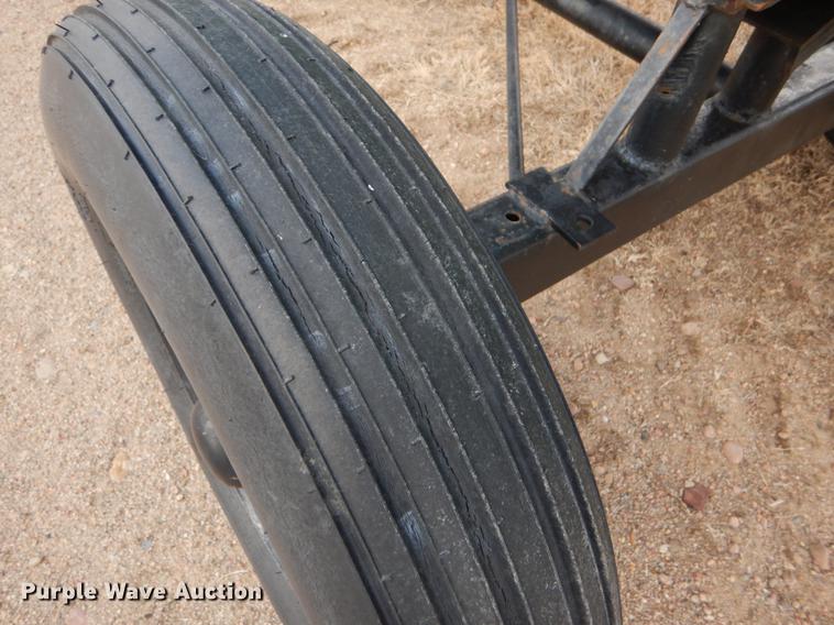 image for item FH9015 1990 John Deere 930 rigid head and trailer