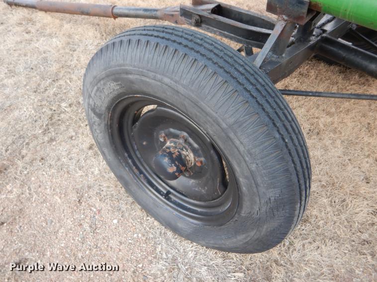 image for item FH9015 1990 John Deere 930 rigid head and trailer