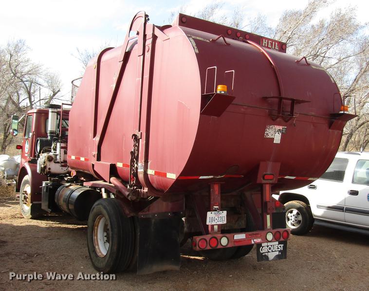 image for item DB6879 1999 Volvo Xpeditor refuse truck