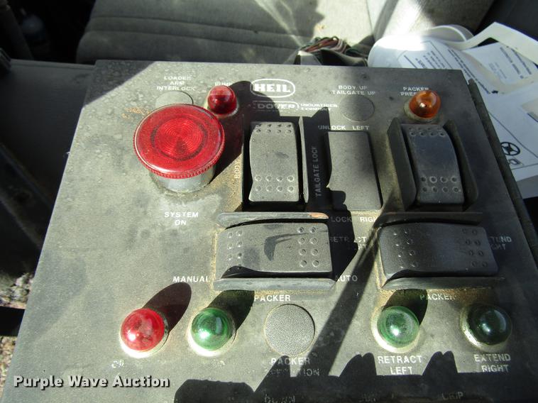 image for item DB6879 1999 Volvo Xpeditor refuse truck