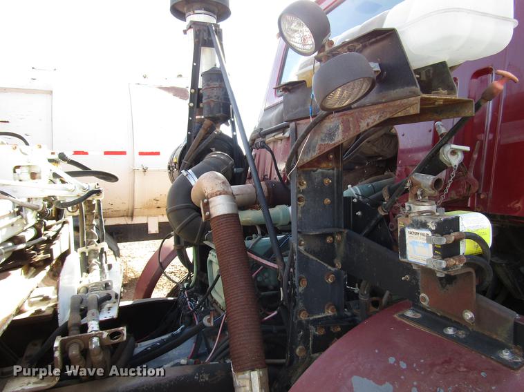 image for item DB6879 1999 Volvo Xpeditor refuse truck