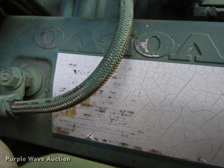 image for item DB6879 1999 Volvo Xpeditor refuse truck