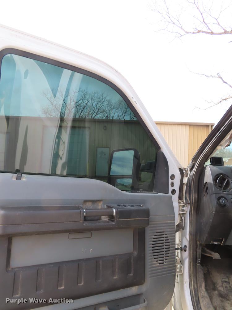 image for item DF1353 2011 Ford F550 Crew Cab flatbed truck