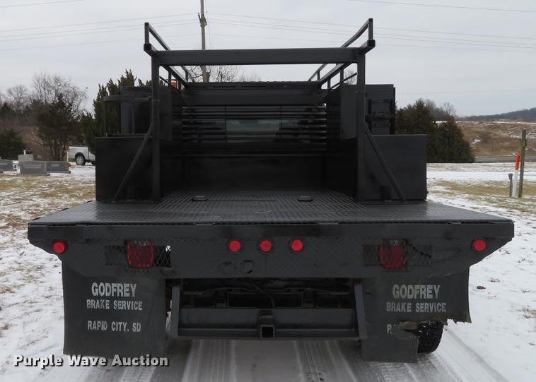 image for item DG3868 2006 Ford F450 Super Duty XL Crew Cab flatbed truck