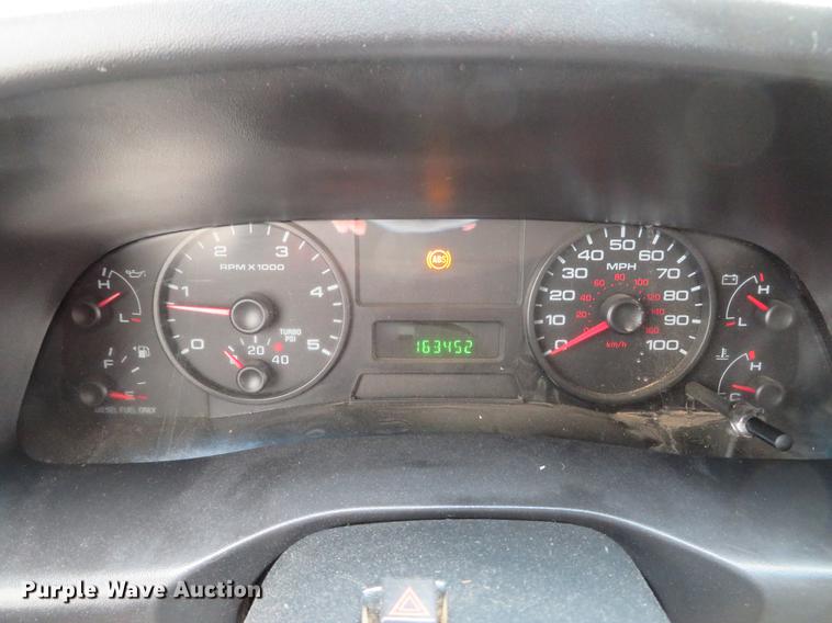 image for item DG3868 2006 Ford F450 Super Duty XL Crew Cab flatbed truck