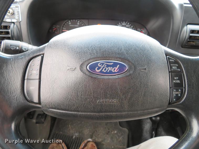 image for item DG3868 2006 Ford F450 Super Duty XL Crew Cab flatbed truck