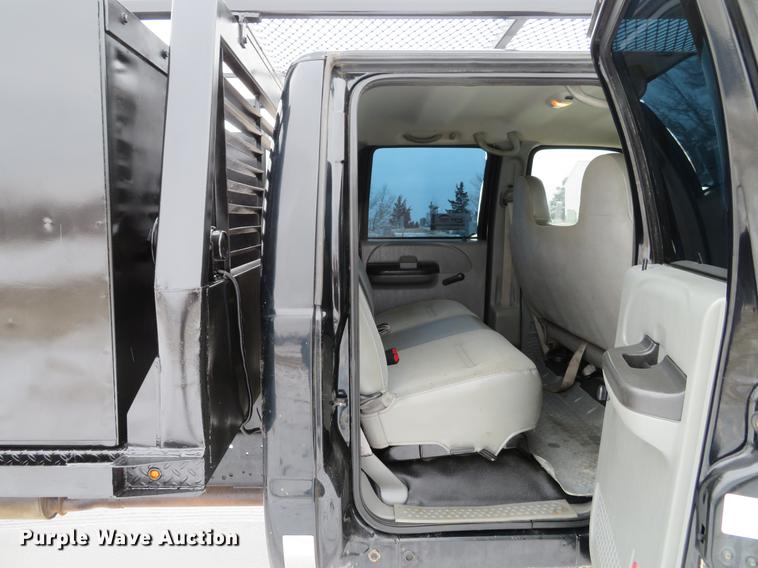 image for item DG3868 2006 Ford F450 Super Duty XL Crew Cab flatbed truck