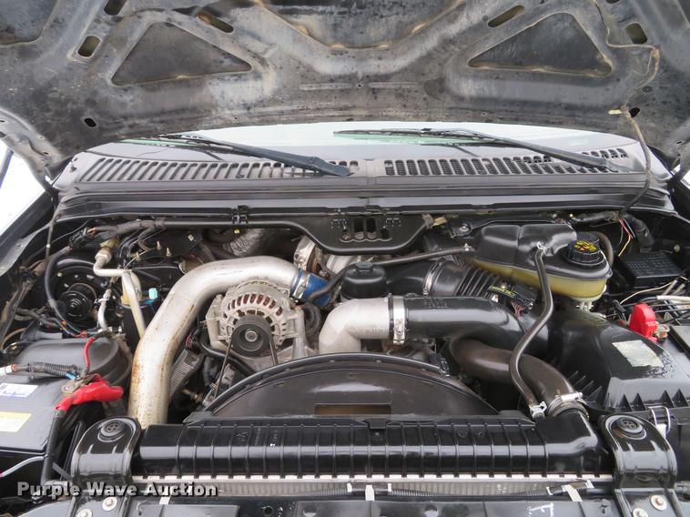 image for item DG3868 2006 Ford F450 Super Duty XL Crew Cab flatbed truck