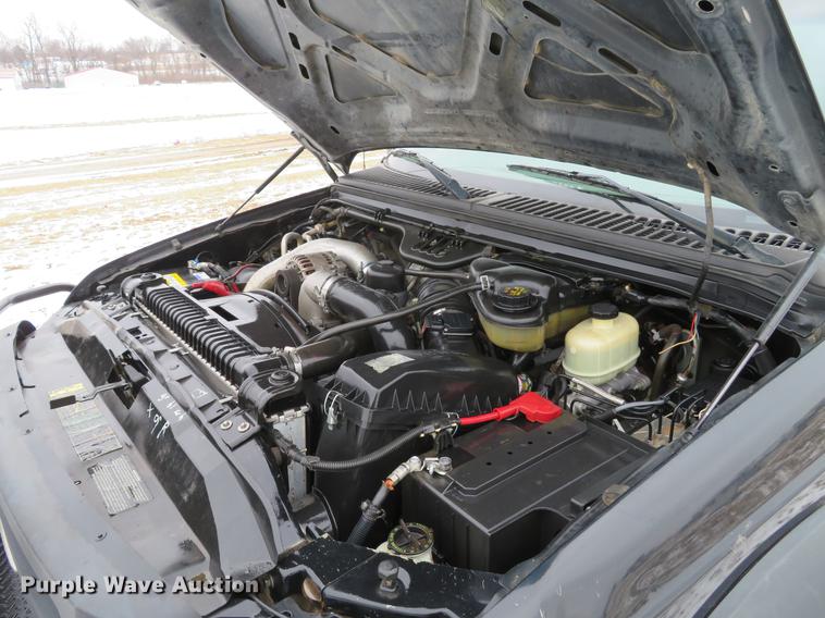 image for item DG3868 2006 Ford F450 Super Duty XL Crew Cab flatbed truck