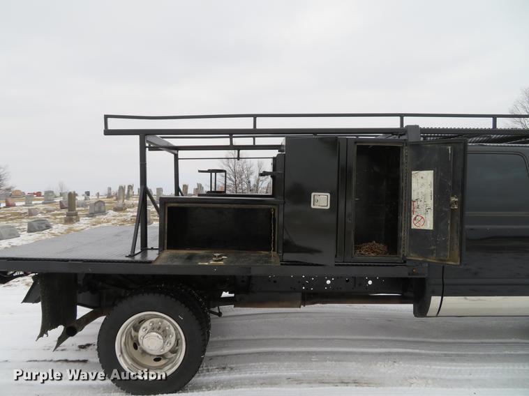 image for item DG3868 2006 Ford F450 Super Duty XL Crew Cab flatbed truck