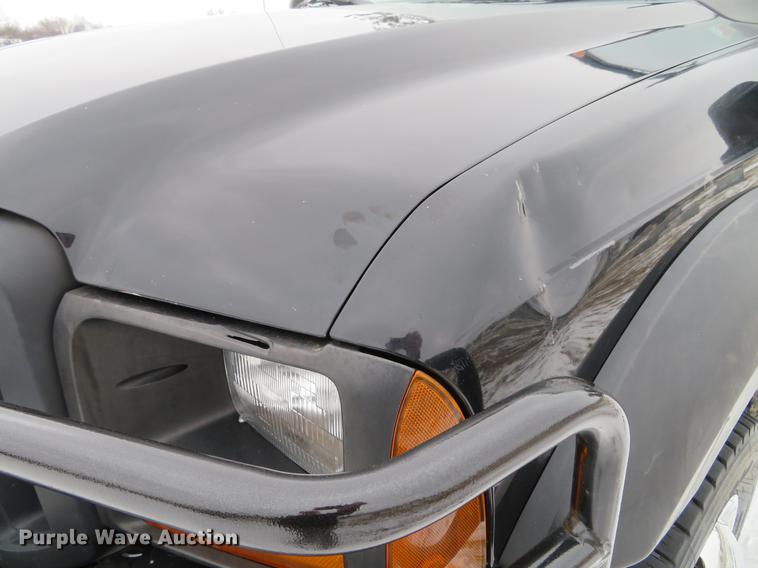 image for item DG3868 2006 Ford F450 Super Duty XL Crew Cab flatbed truck