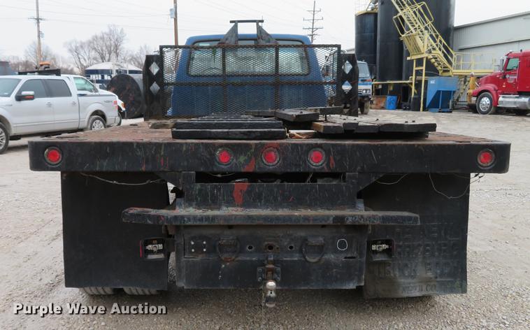 image for item DG3878 1993 Ford F700 flatbed truck