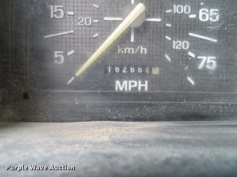 image for item DG3878 1993 Ford F700 flatbed truck