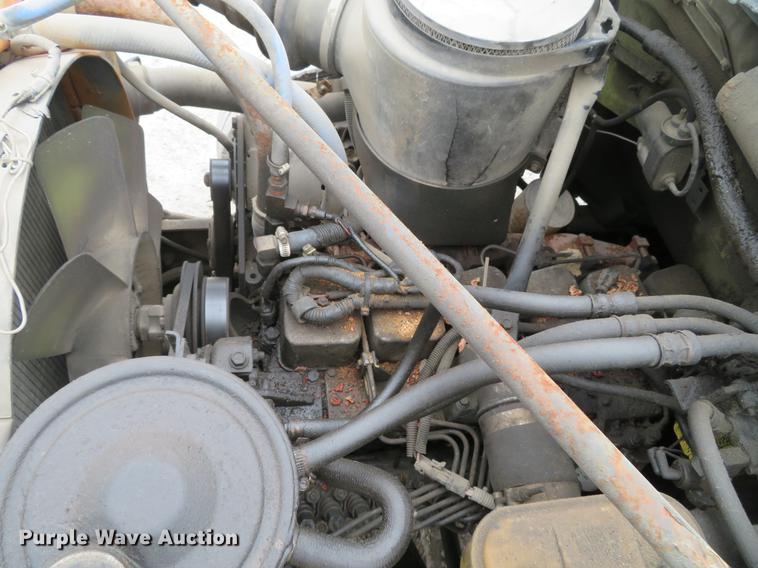 image for item DG3878 1993 Ford F700 flatbed truck