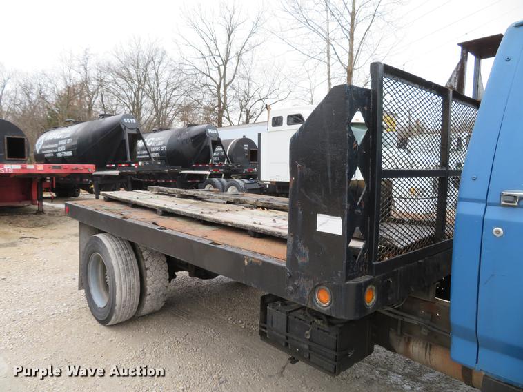 image for item DG3878 1993 Ford F700 flatbed truck