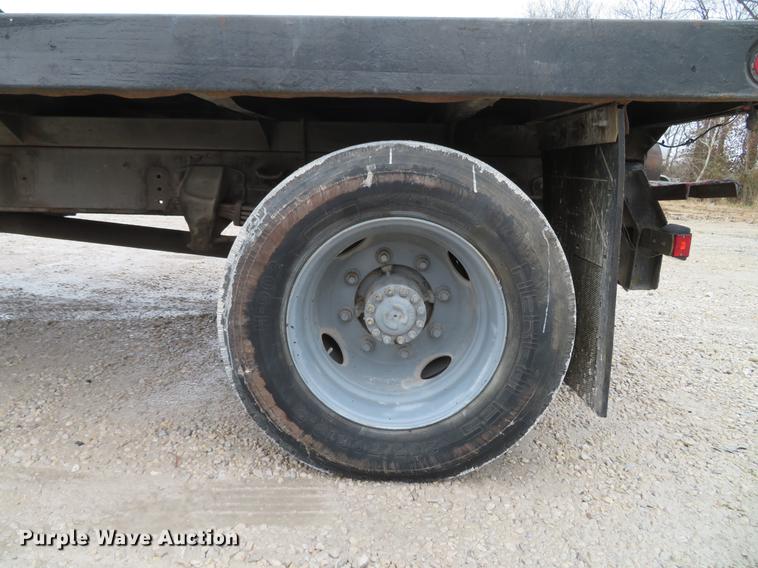 image for item DG3878 1993 Ford F700 flatbed truck