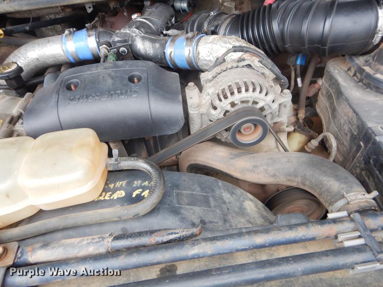 image for item FQ9549 2002 Ford F550 flatbed pickup truck