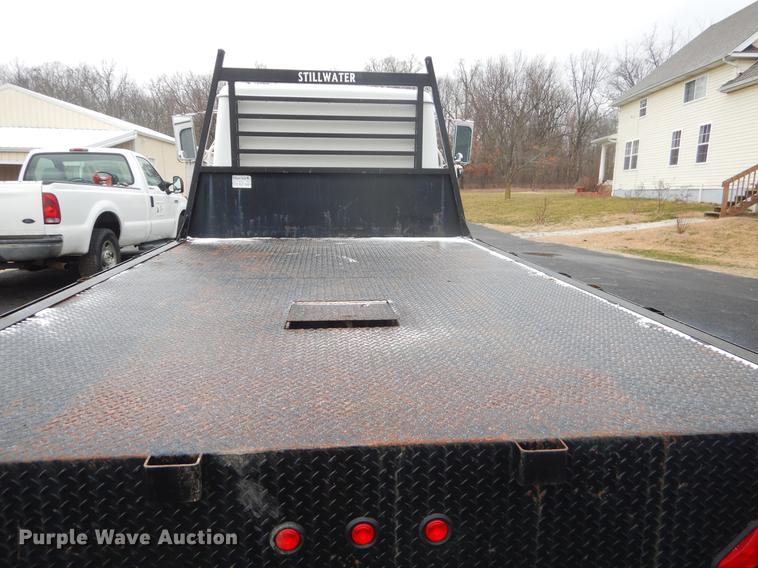 image for item FQ9551 2000 International 4700 flatbed truck