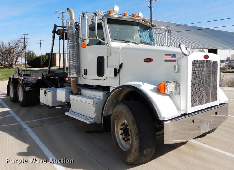 image for item DC0198 2013 Peterbilt 365 roll off truck