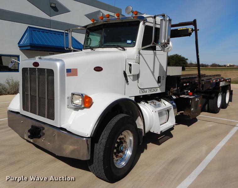image for item DC0202 2012 Peterbilt 365 roll off truck