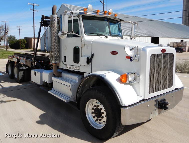 image for item DC0202 2012 Peterbilt 365 roll off truck