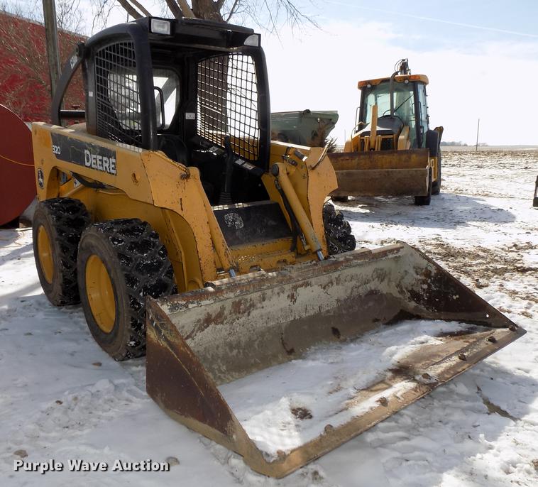 image for item DE7595 2005 John Deere 320 skid steer