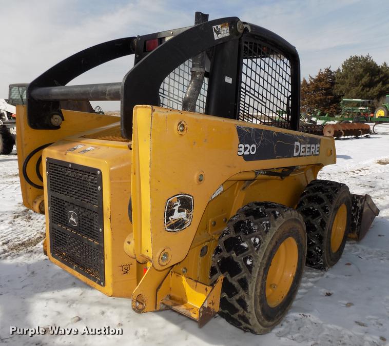 image for item DE7595 2005 John Deere 320 skid steer