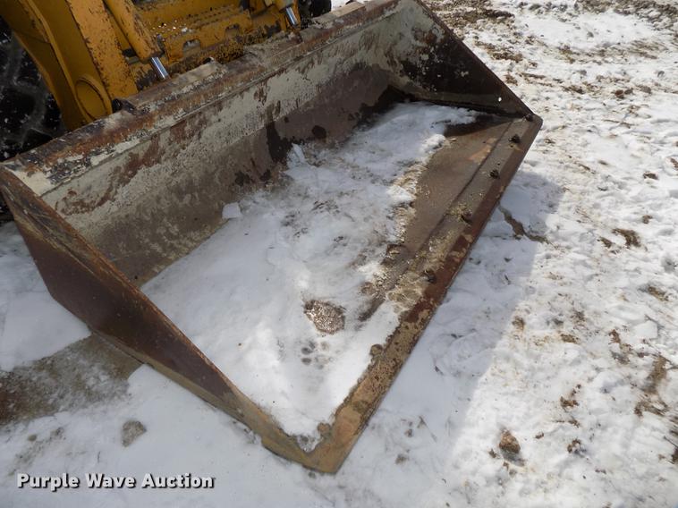 image for item DE7595 2005 John Deere 320 skid steer