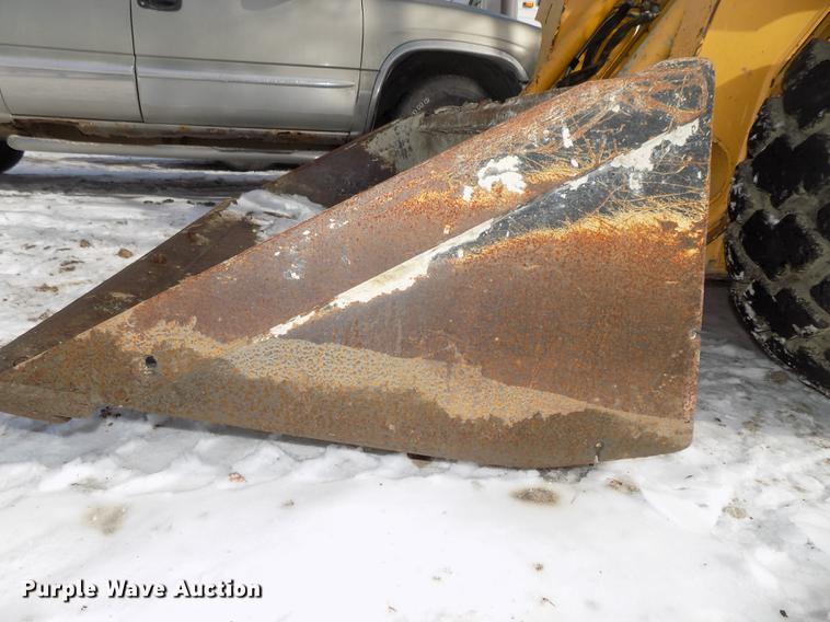 image for item DE7595 2005 John Deere 320 skid steer