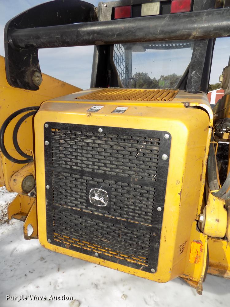 image for item DE7595 2005 John Deere 320 skid steer
