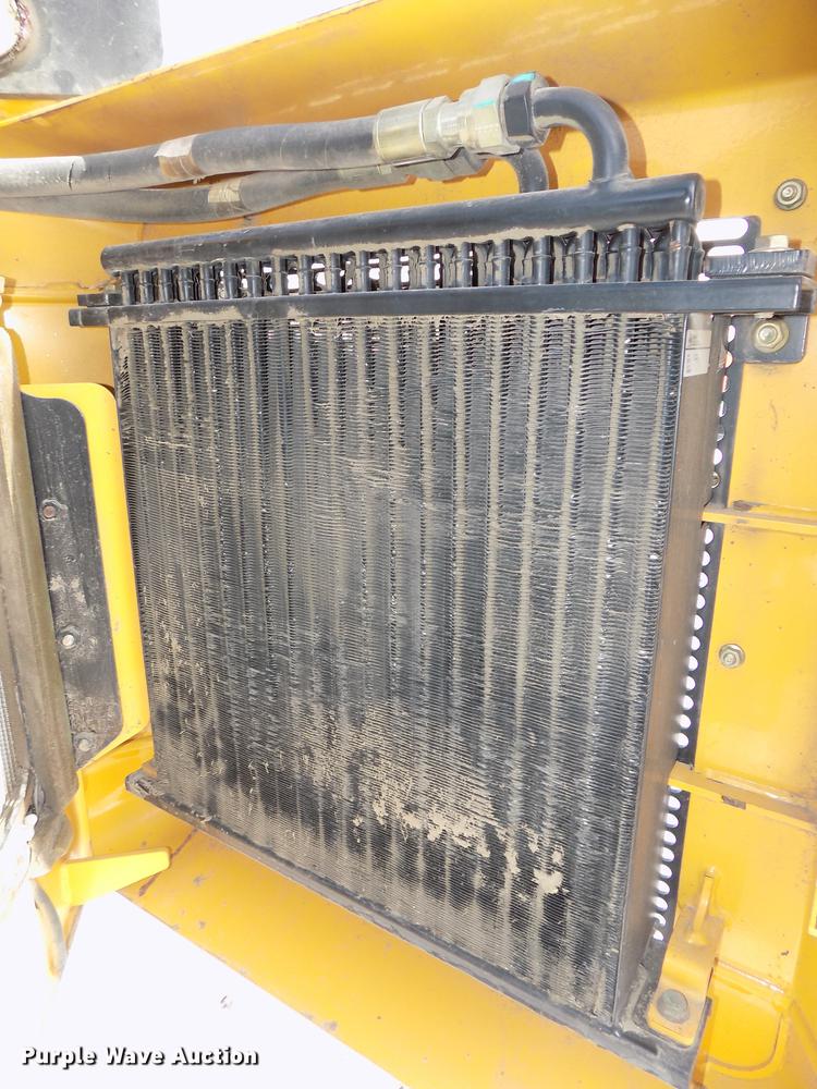 image for item DE7595 2005 John Deere 320 skid steer