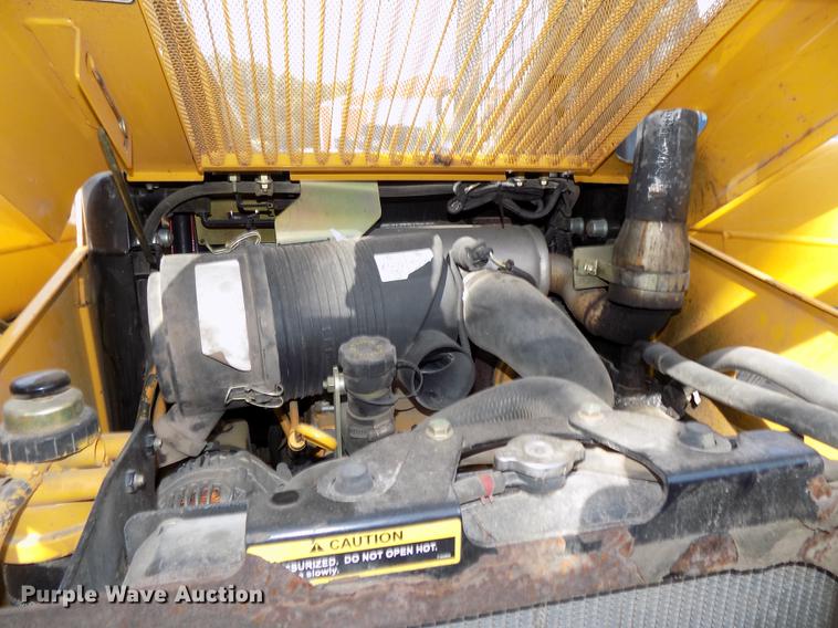 image for item DE7595 2005 John Deere 320 skid steer